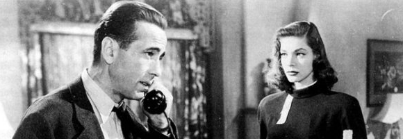 Humphrey Bogart as Philip Marlowe and Lauren Bacall as Vivian Rutledge in 'The Big Sleep,' directed by Howard Hawks (1946)