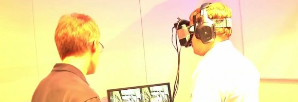 John Carmack, on the left, demonstrating a prototype of his VR goggles to PCGamer's David Boddington at E3 2012