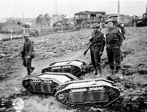 British soldiers with three captured Goliath units during the Battle of Normandy in 1944