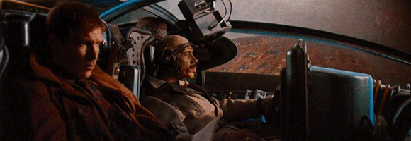 Rick Deckard (Harrison Ford) and Gaff (Edward James Olmos) inside the police spinner in 'Blade Runner' (Scott 1982)