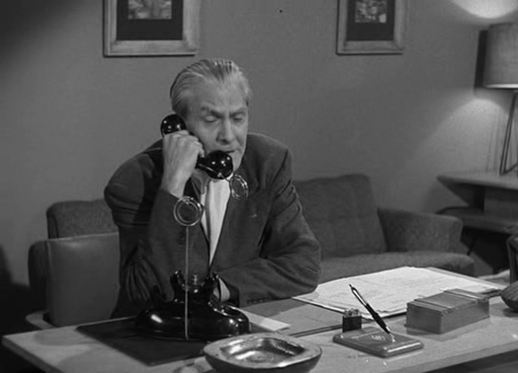 Doctor Wernher (Larry Johns) on a wireless phone in Richard Talmadge's 1953 movie "Project Moon Base"